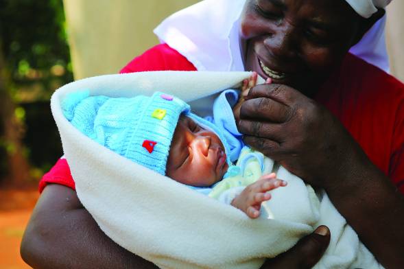 birth companion and baby in kenya