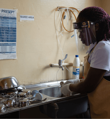 a-nurse-in-uganda-sterlizes-medical-equipment